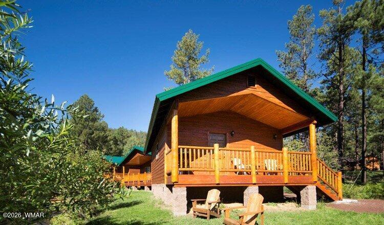 97 Rohrer Road Greer, AZ 85927 - Photo 1 of 14 a front view of house with yard