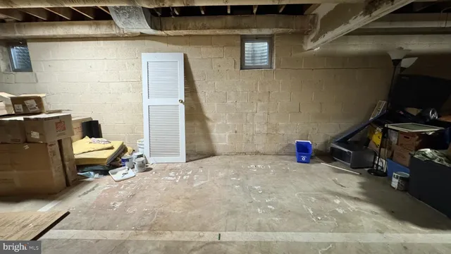 a view of a table and chairs in the garden