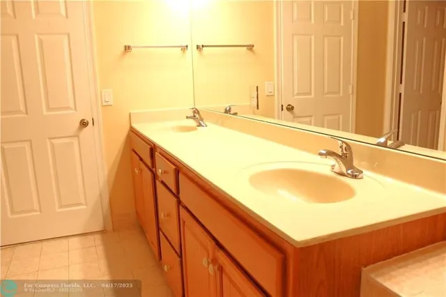 a bathroom with a sink and a bathtub