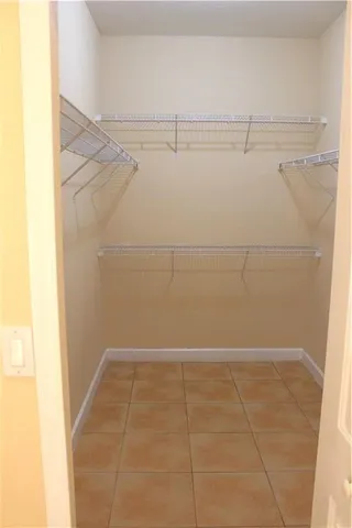 a view of a room with a large window