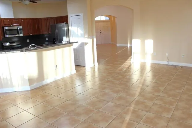 a view of a kitchen with a sink