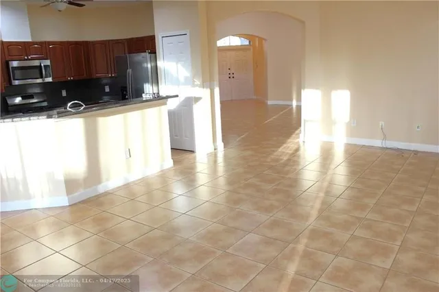 a view of a kitchen with a sink