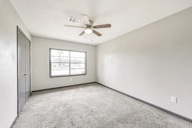 a view of small space with racks on the wall