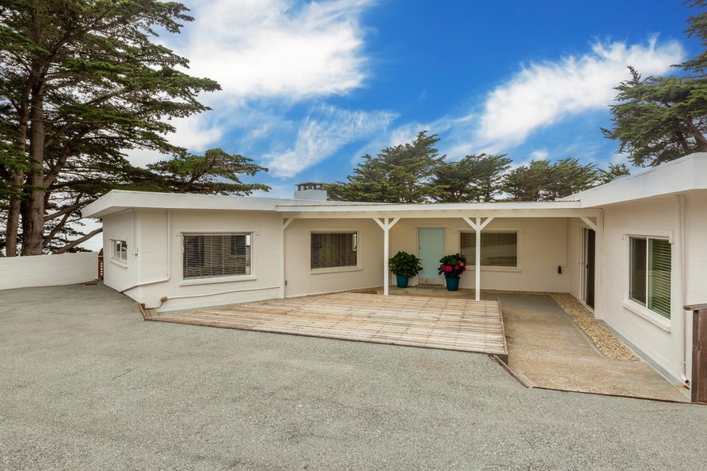 front view of a house with a patio