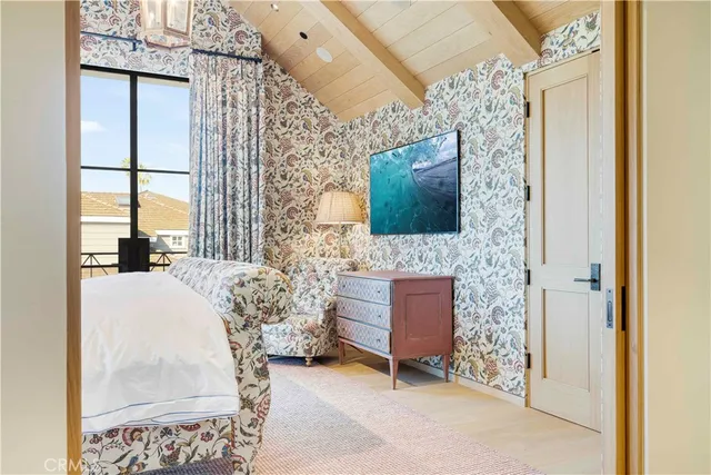 a living room with fireplace furniture and a flat screen tv