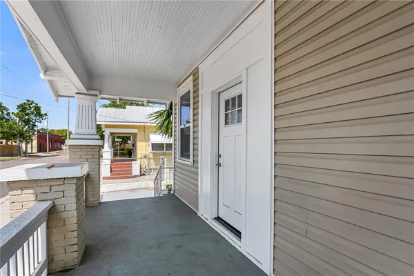 a view of a house with a sink and a porch