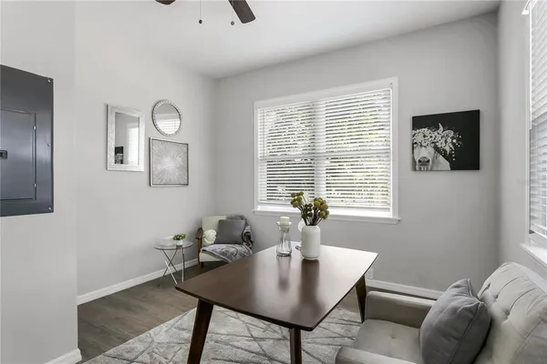 a view of a livingroom with furniture and window