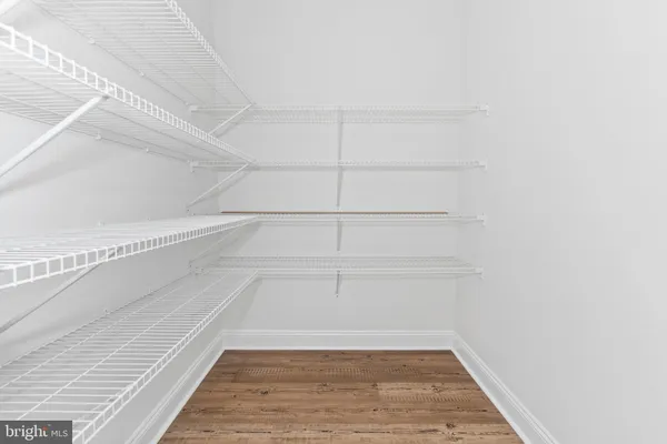 a view of a room with racks on the wall