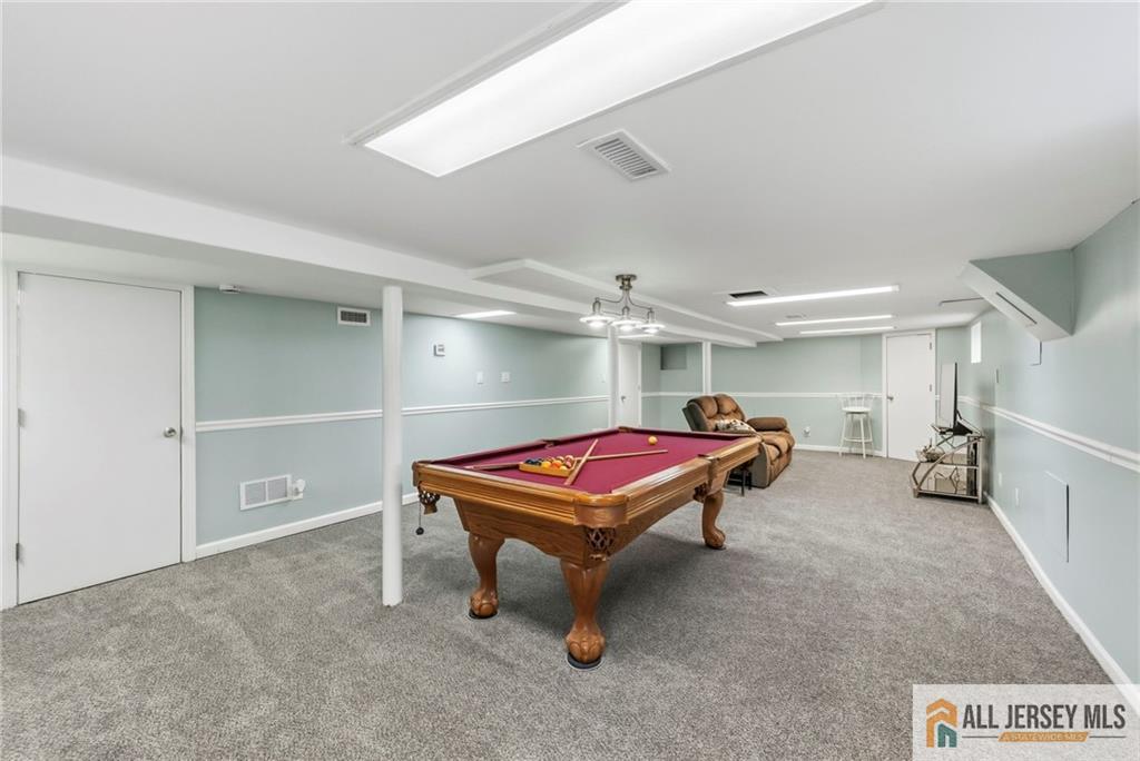 50 3rd Street Fords, NJ 08863 - Photo 25 of 36 a room with furniture and air hockey table