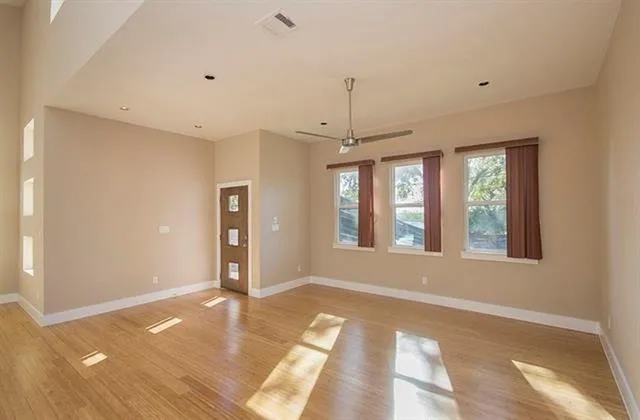 a view of an empty room with a window