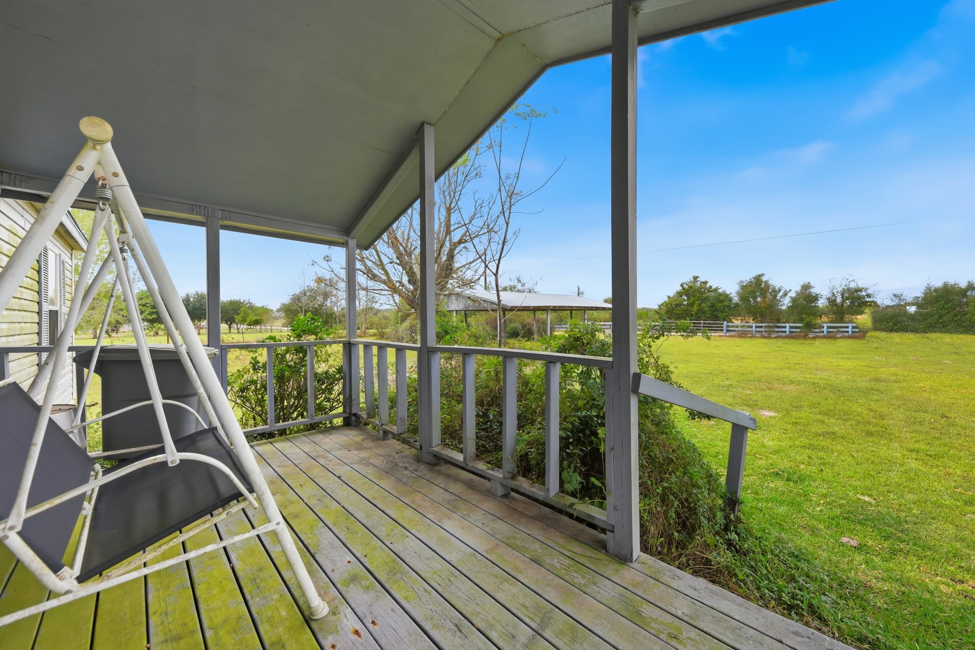 1901 Newsom Road Bellville, TX 77418 - Photo 6 of 20 a view of a balcony with ocean view