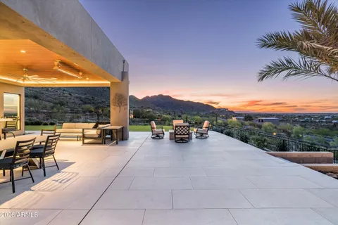 a view of a house with a flat outdoor space