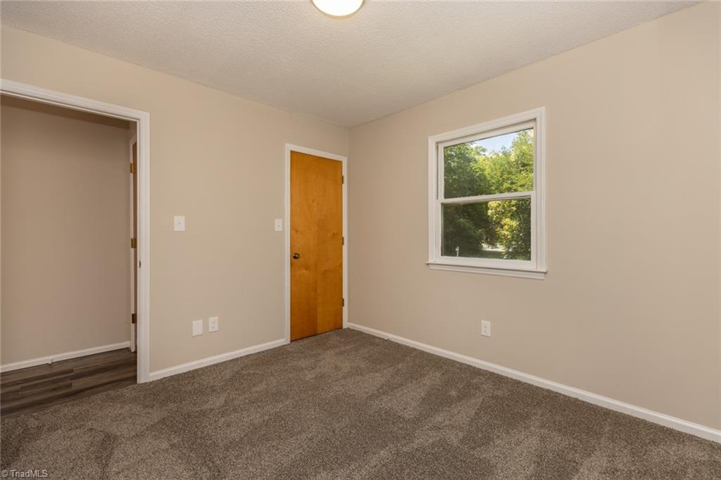 314 Spring Street Thomasville, NC 27360 - Photo 31 of 32 All bedrooms are a good size, have plenty of natural light and storage.