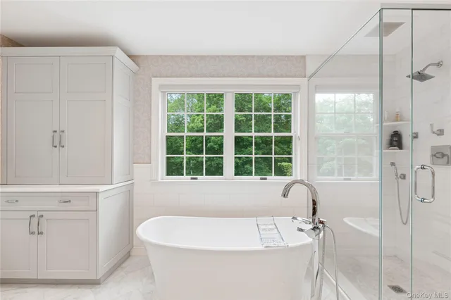 a bathroom with a sink and a bathtub