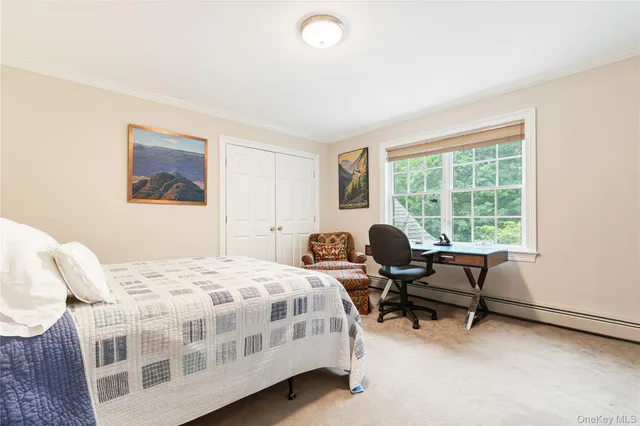 a white bath tub sitting next to a window
