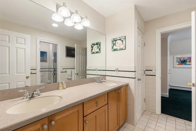 a bed room with a bed and a chair