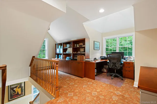 a view of a livingroom with furniture and window
