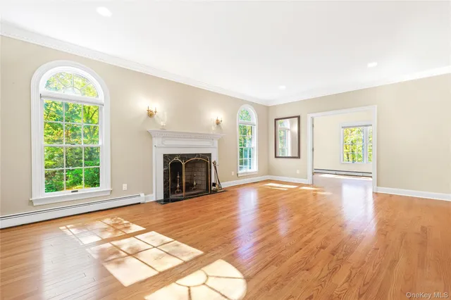 a kitchen that has a lot of cabinets in it and stainless steel appliances