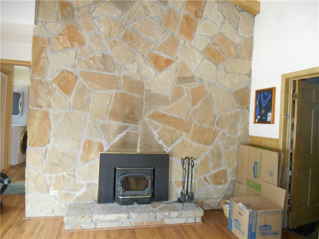 1346 Rostraver Road Belle Vernon, PA 15012 - Photo 8 of 20 FIREPLACE WITH WOOD BURNER IN FAMILY ROOM