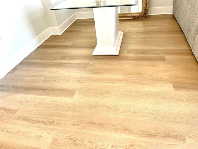 a living room with a couch and a rug