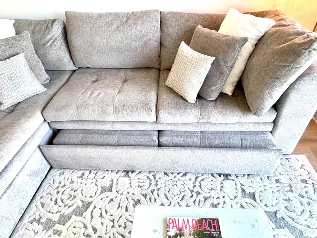 a bathroom with a sink a mirror and a shower