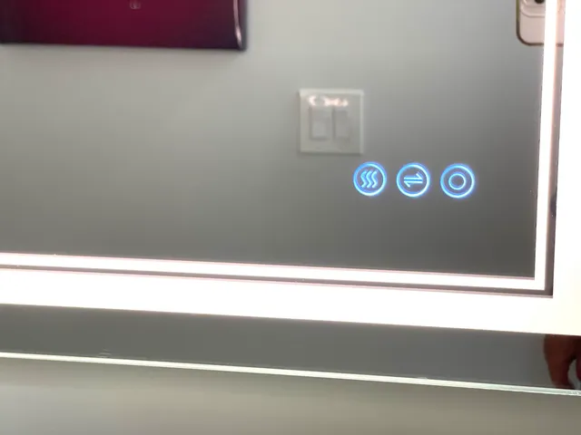 a bedroom with a bed and a mirror