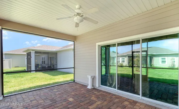 a view of a livingroom with a swimming pool