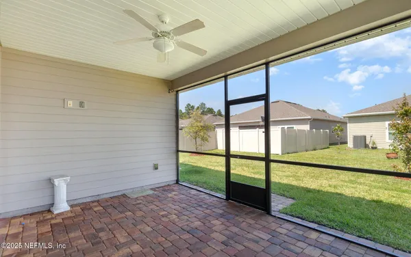 a view of a porch with a yard