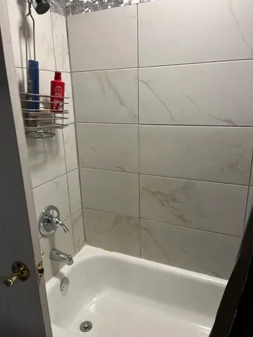 a bathroom with a bathtub