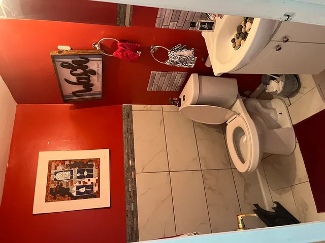 a view of living room with entryway and furniture