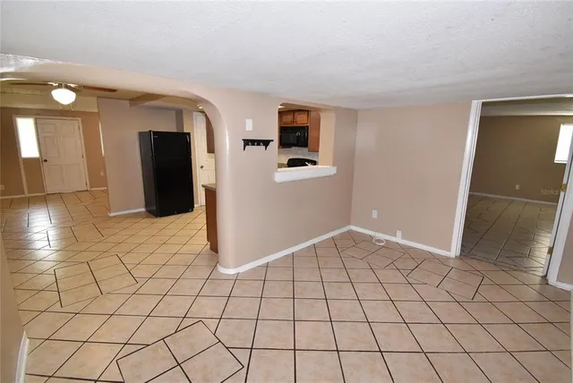 a view of an empty room and window