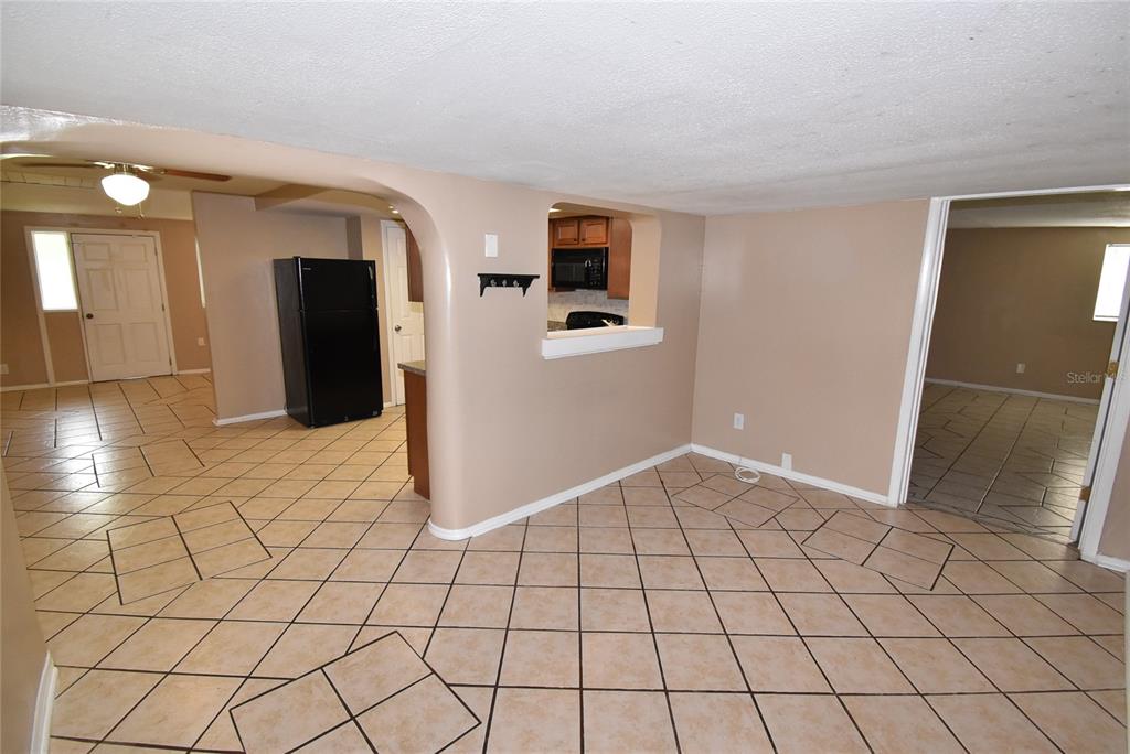 7524 Galahad Road Port Richey, FL 34668 - Photo 11 of 26 a view of a livingroom and an empty room