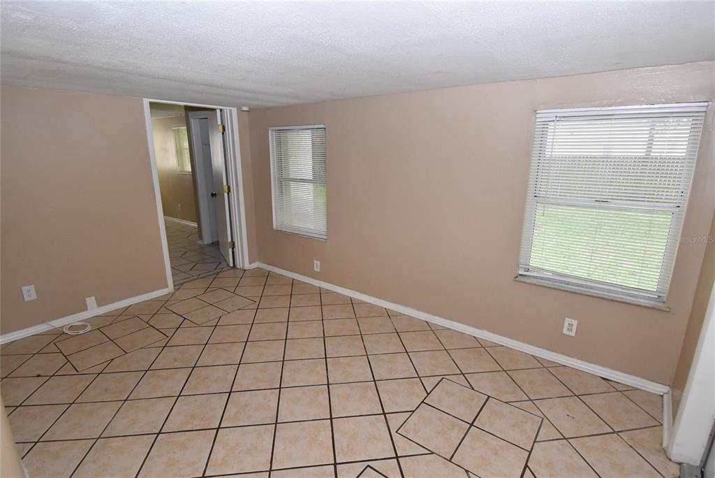 7524 Galahad Road Port Richey, FL 34668 - Photo 14 of 26 a view of an empty room and window