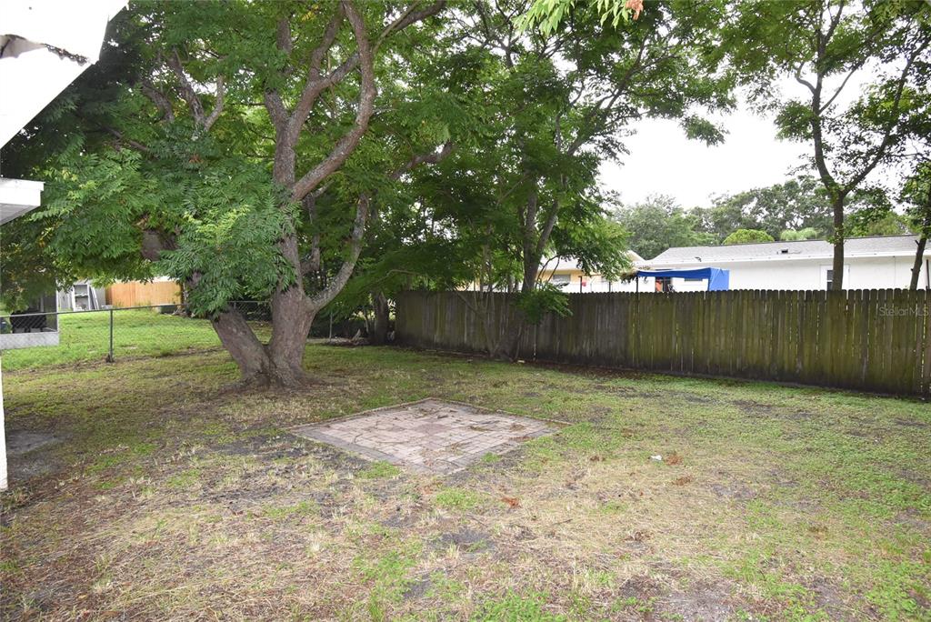 7524 Galahad Road Port Richey, FL 34668 - Photo 17 of 26 a view of outdoor space with trees