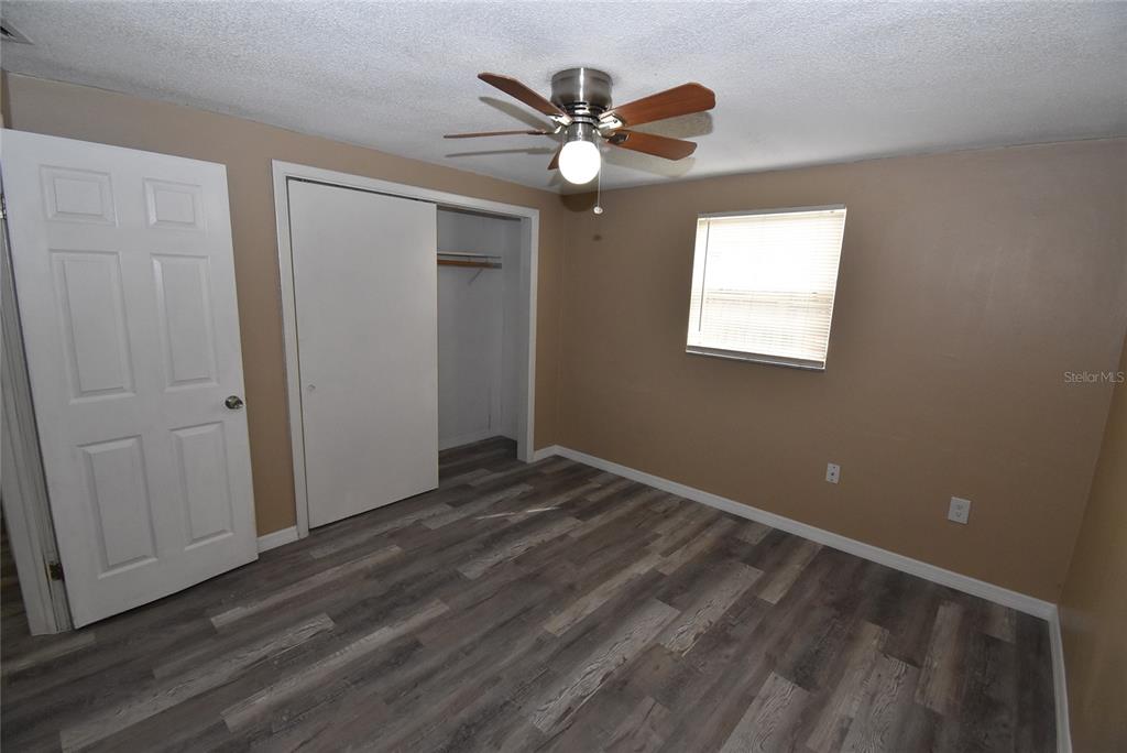 7524 Galahad Road Port Richey, FL 34668 - Photo 23 of 26 a view of an empty room with a window