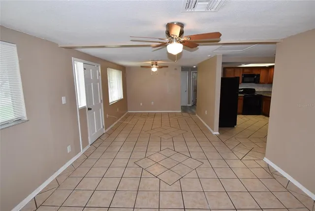 en empty room with windows