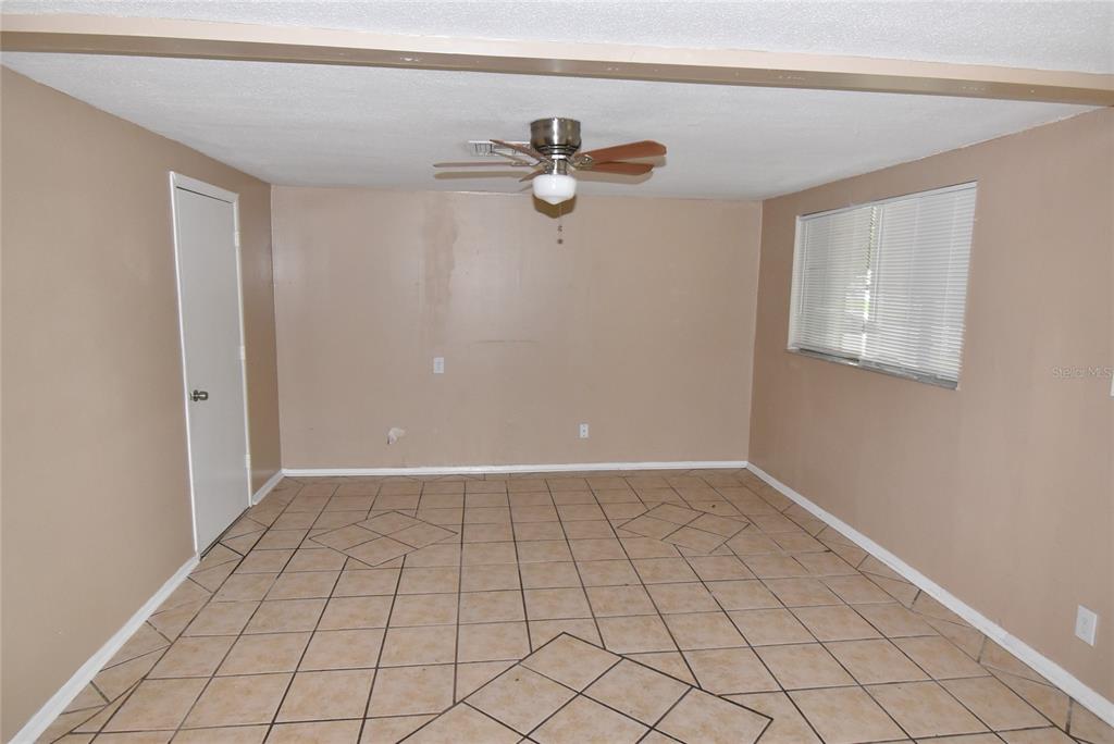 7524 Galahad Road Port Richey, FL 34668 - Photo 9 of 26 a view of an empty room and window
