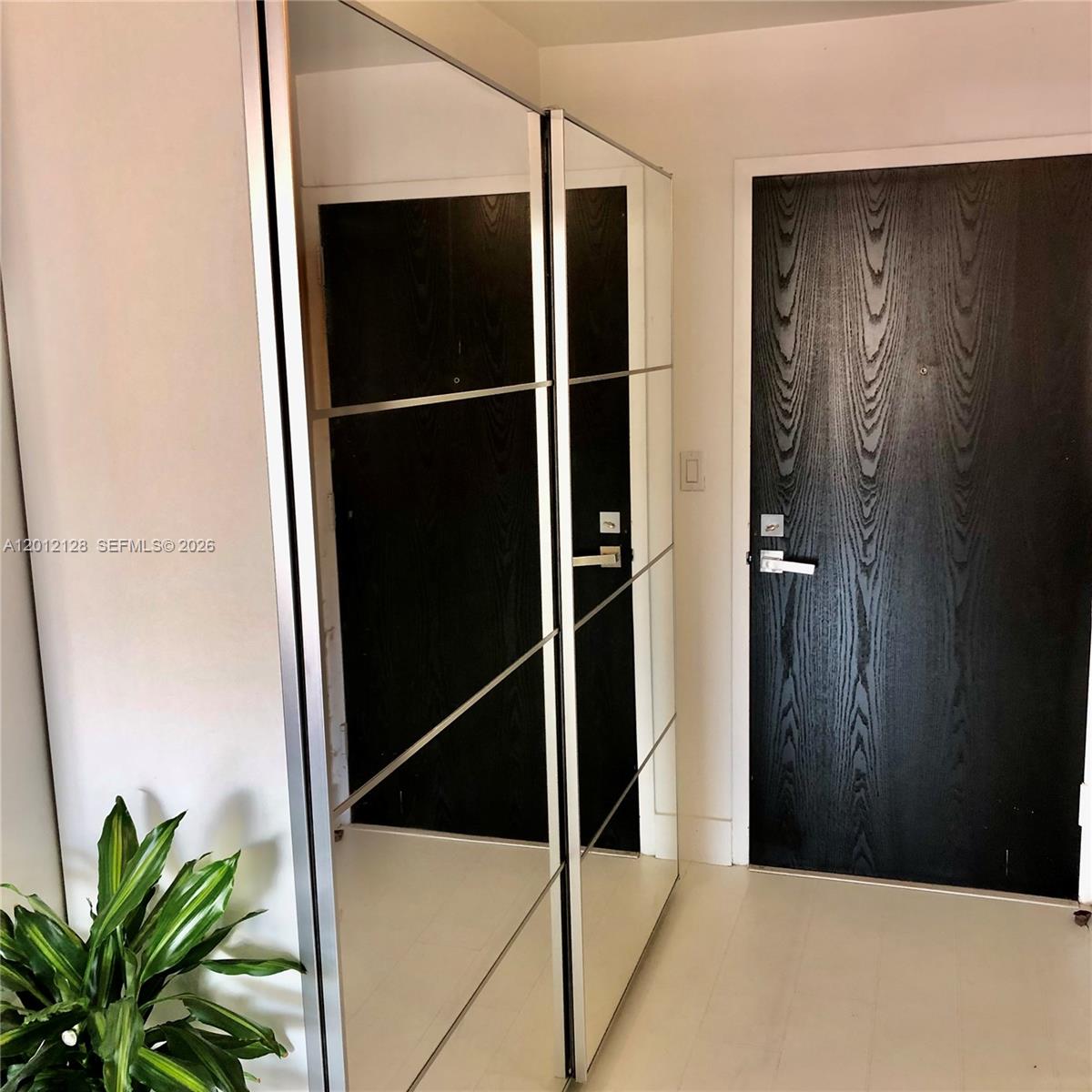 90 Alton Road, Unit 307 Miami Beach, FL 33139 - Photo 7 of 11 a view of closet