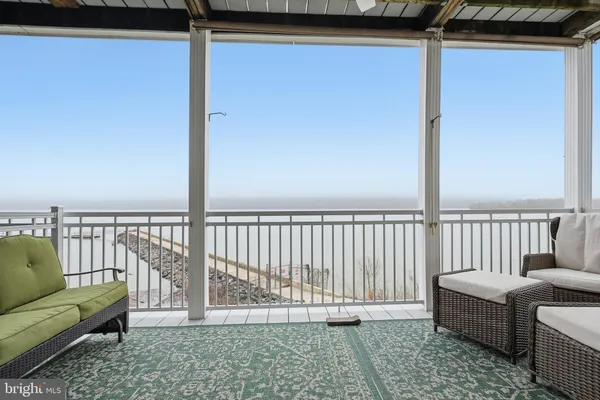 a balcony with furniture