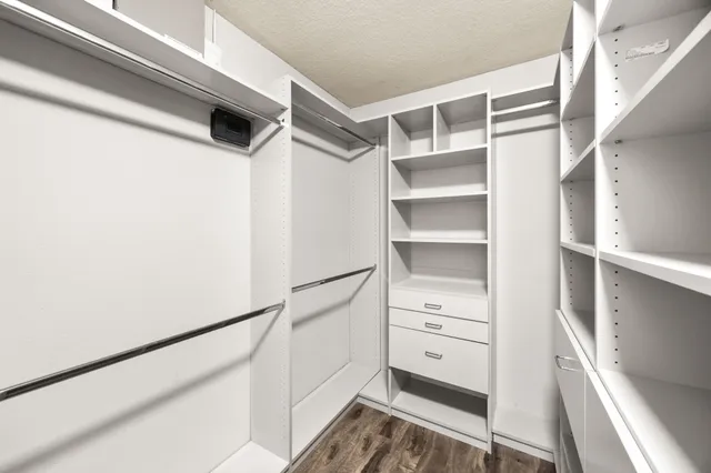 a view of an empty walk in closet