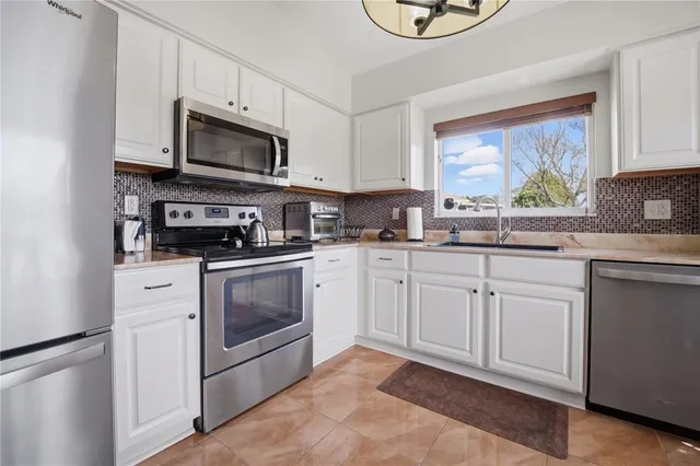 a front view of a house with swimming pool