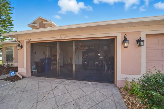 a bathroom with a sink a toilet and a shower