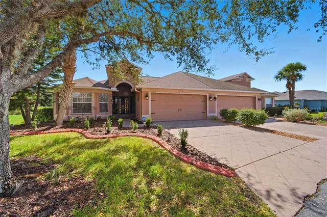 a utility room with sink dryer and washer