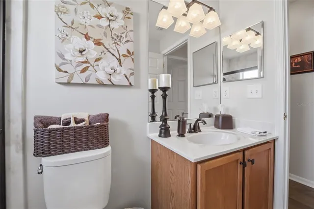 an aerial view of a house with a lake view