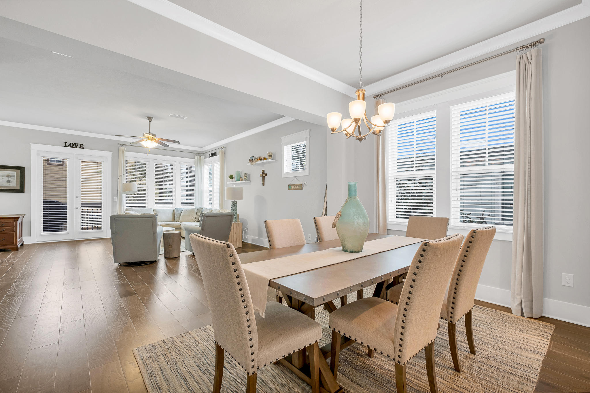 91 Grande Pointe Circle Inlet Beach, FL 32461 - Photo 15 of 49 a view of a dining room with furniture window and wooden floor