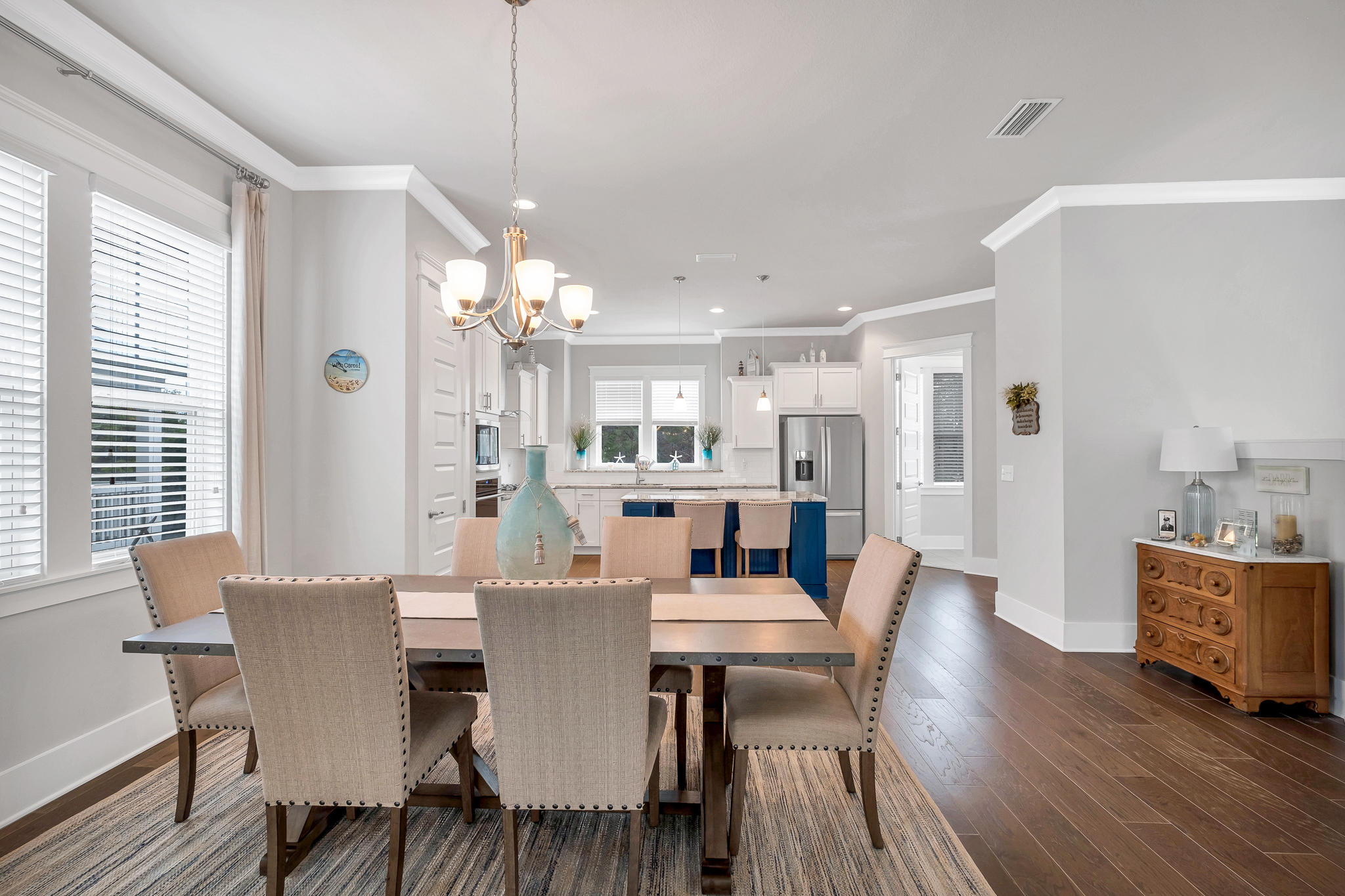 91 Grande Pointe Circle Inlet Beach, FL 32461 - Photo 17 of 49 a view of a dining room with furniture and wooden floor