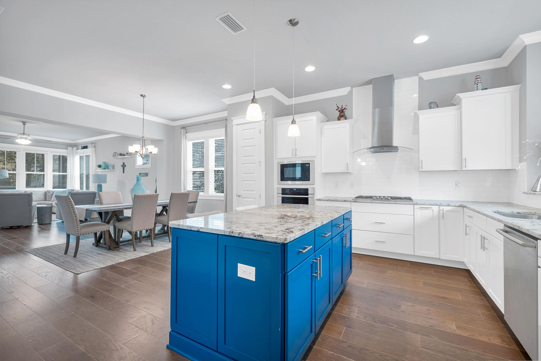 91 Grande Pointe Circle Inlet Beach, FL 32461 - Photo 23 of 49 a kitchen with stainless steel appliances kitchen island granite countertop a sink and cabinets
