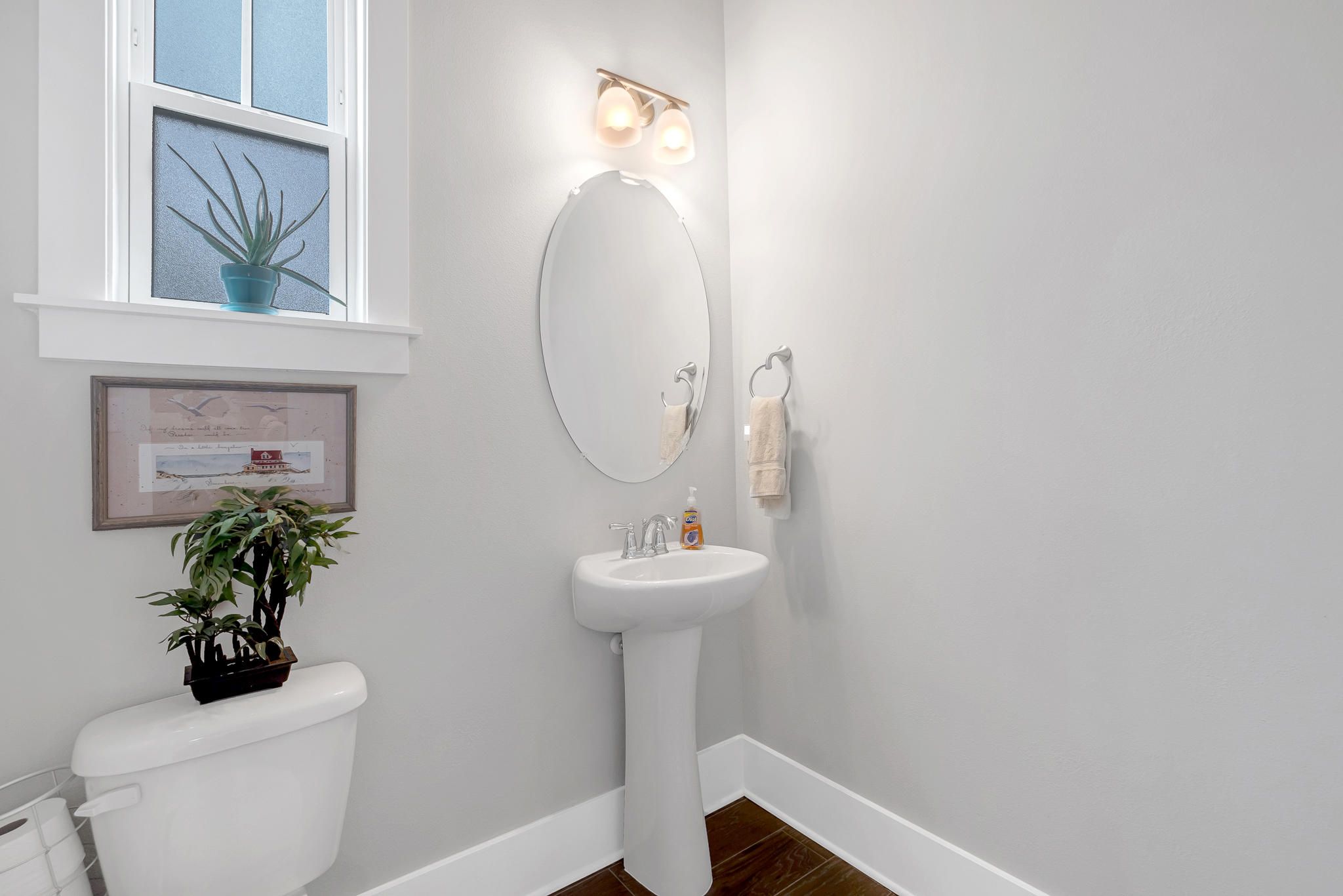 91 Grande Pointe Circle Inlet Beach, FL 32461 - Photo 27 of 49 a bathroom with a sink toilet and a mirror