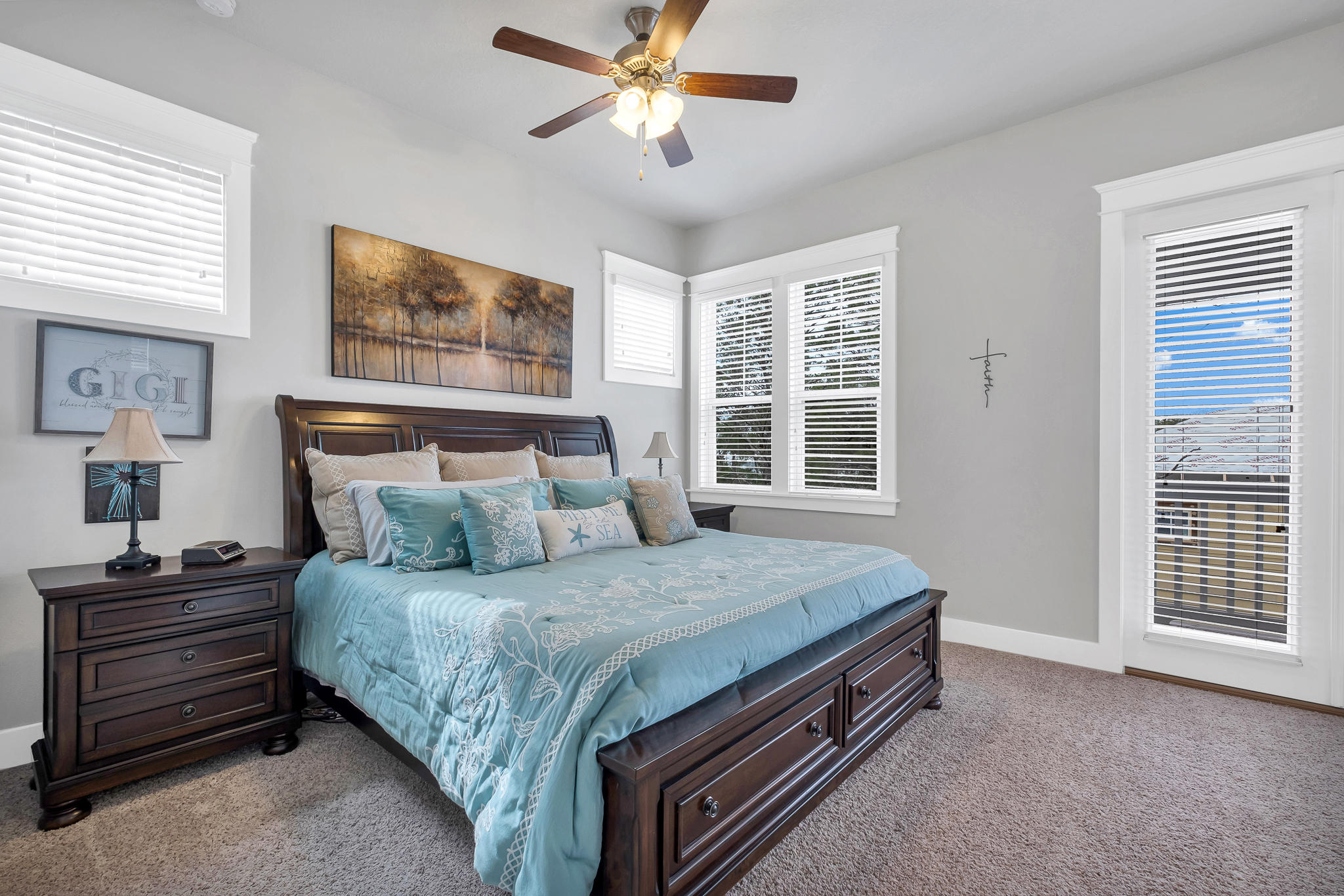 91 Grande Pointe Circle Inlet Beach, FL 32461 - Photo 29 of 49 a bedroom with a bed and a chandelier
