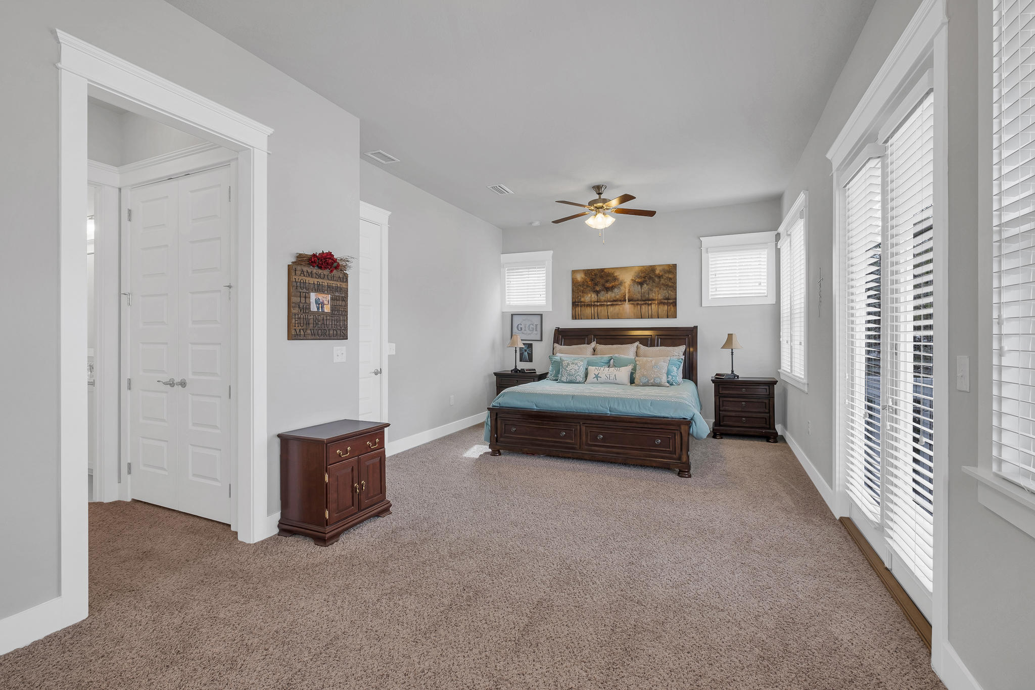 91 Grande Pointe Circle Inlet Beach, FL 32461 - Photo 31 of 49 a bedroom with furniture and a chandelier
